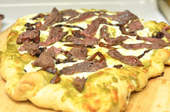 Hatch Chile Sauce Pizza with Grilled Steak and Caramelized Onions